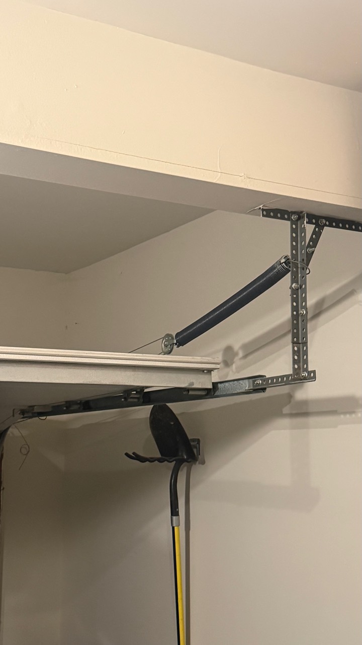 Close view of garage door extension spring hardware in Basking Ridge NJ