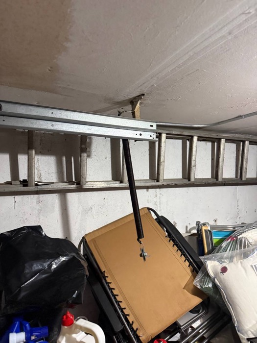 Extension spring installation on residential garage door
