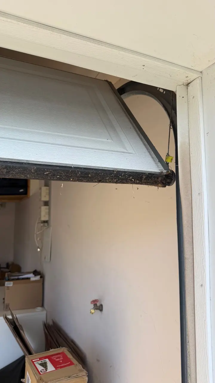Off-track garage door stuck in Lodi NJ
