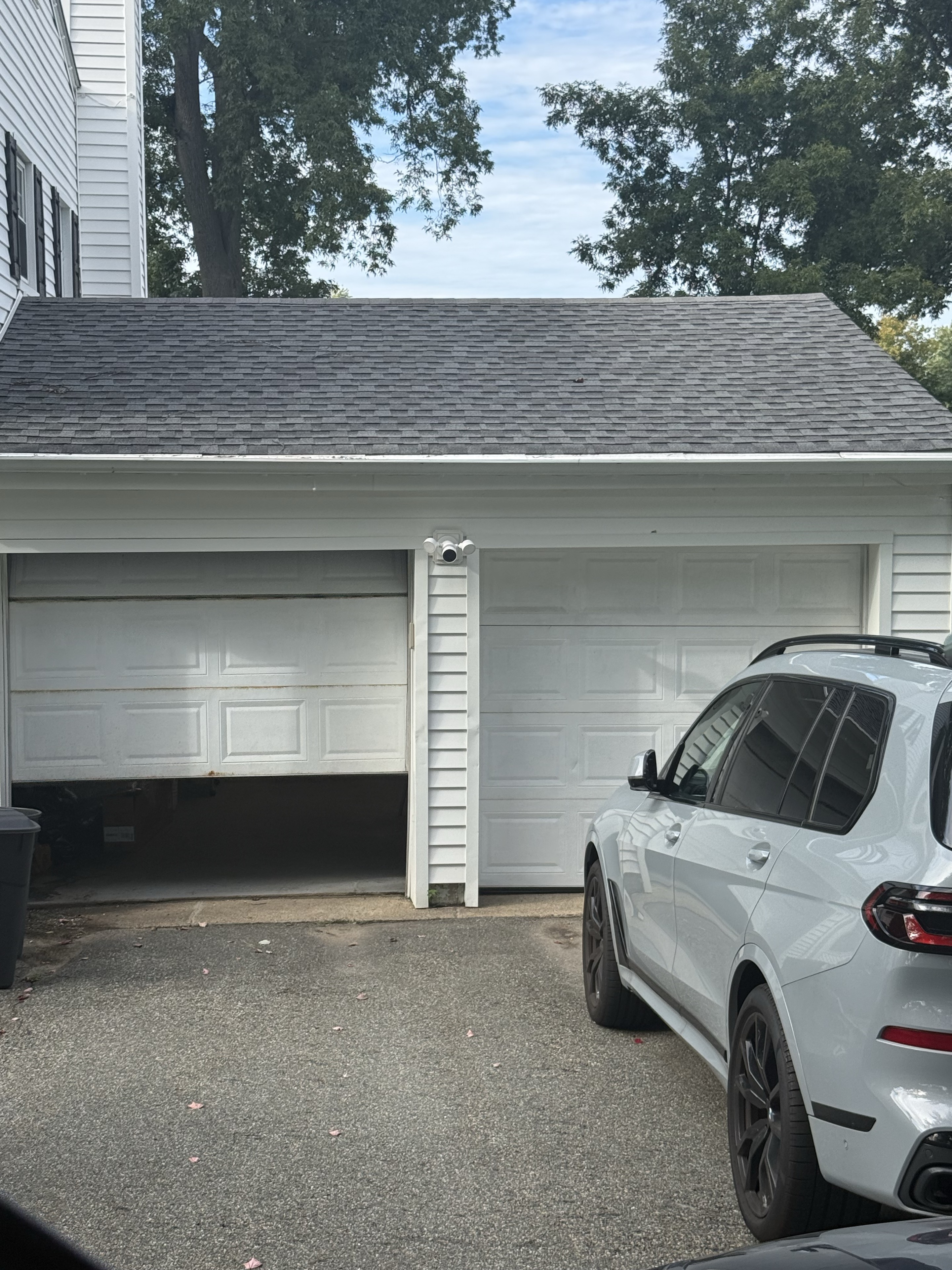 Two single garage doors at our Parsippany inspection and tune-up visit